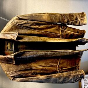 Awesome leather coat from Robert Comstock. Worn look.